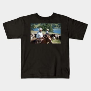 Preparing to herd cattle Kids T-Shirt